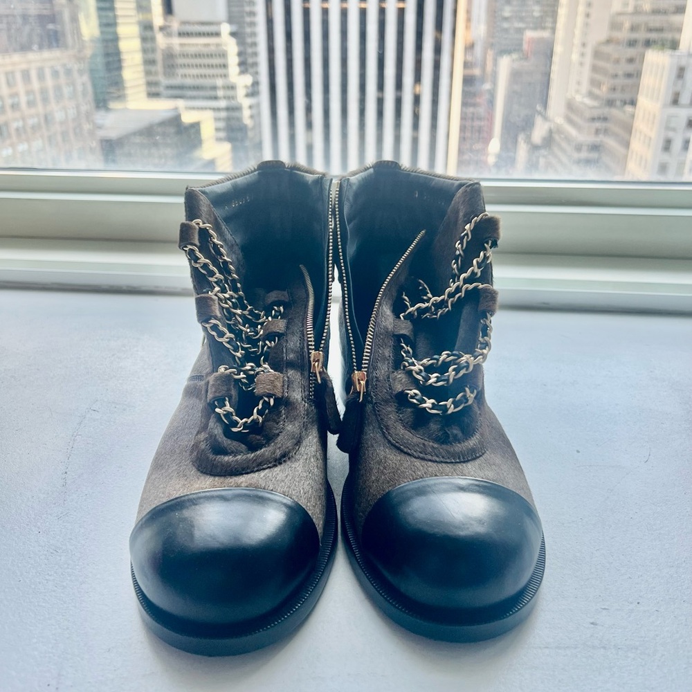 Chanel cow hair booties with chains embellishment